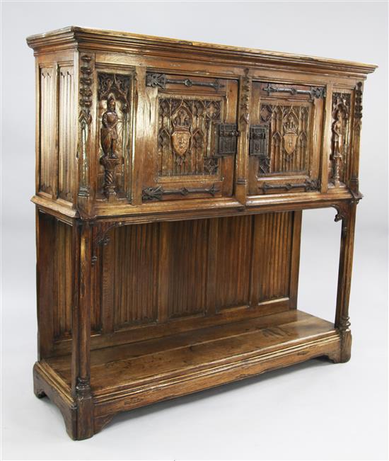 A carved oak Gothic style buffet, W.4ft 11in.